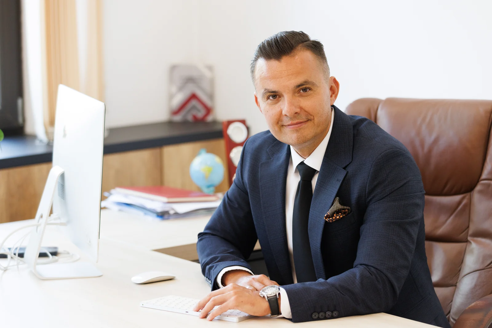 Alexandru Cristian Murar in the Murar și Asociații office