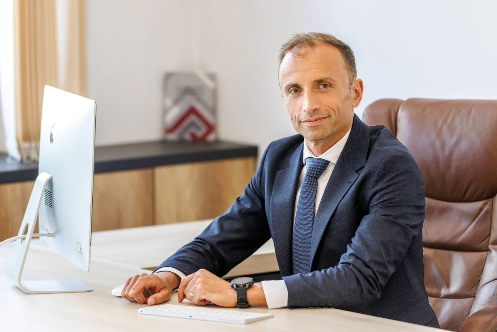 George Iulian Murar in the Murar și Asociații office