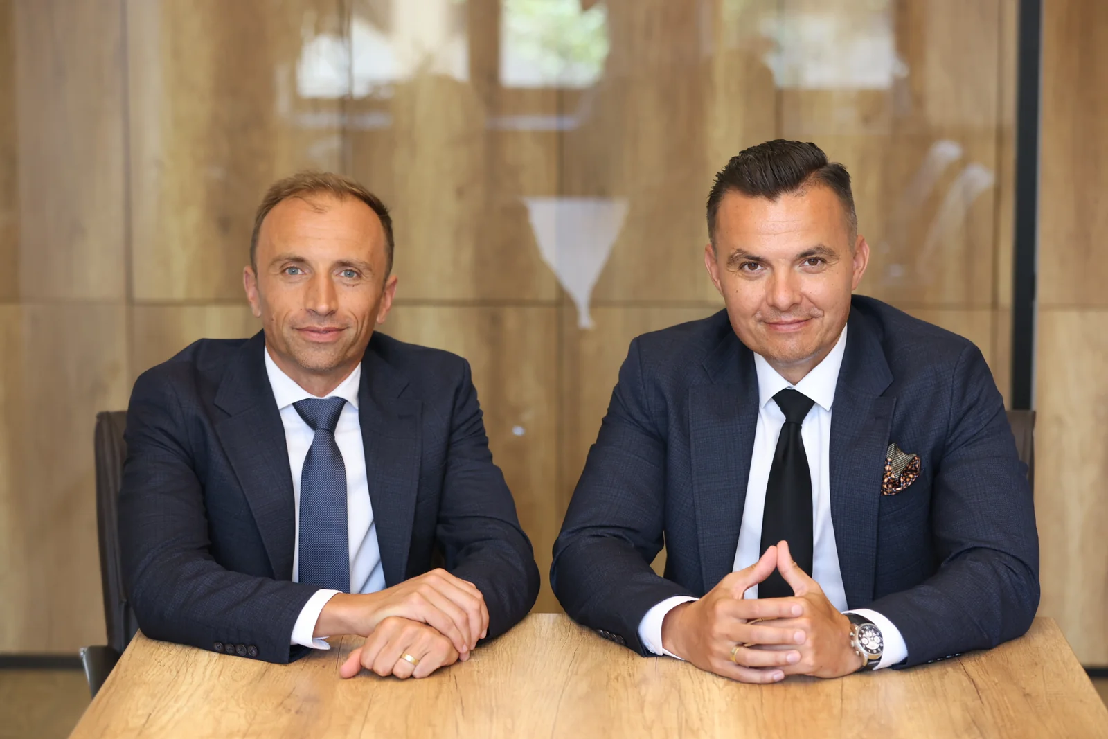 Alexandru Cristian Murar and George Iulian Murar at the meeting table